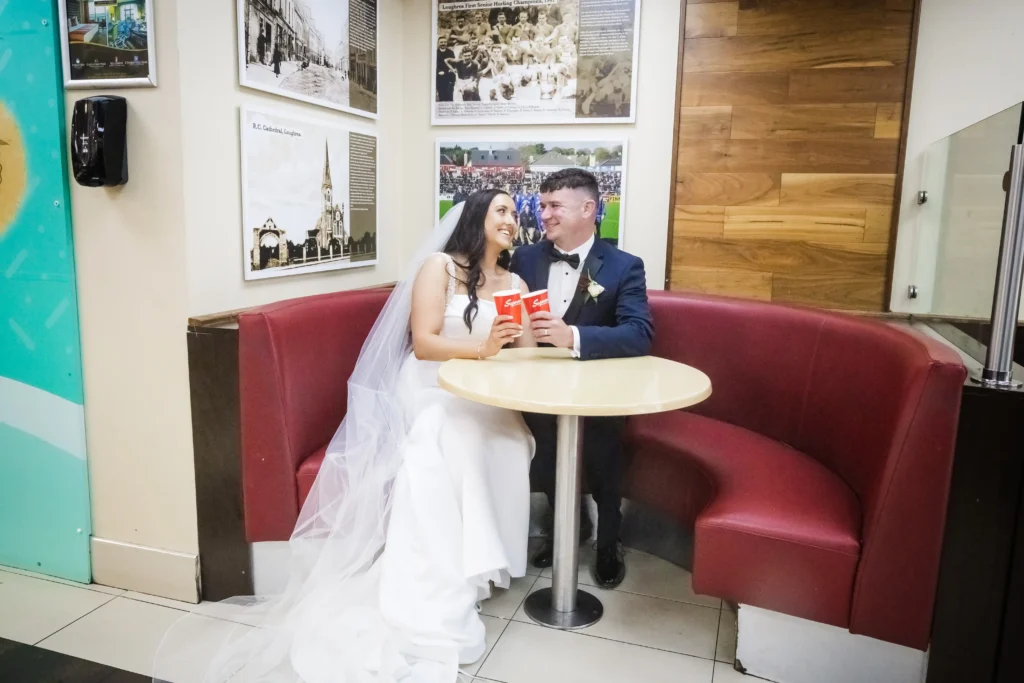 Couple sitting in a booth in Supermacs in Loughrea