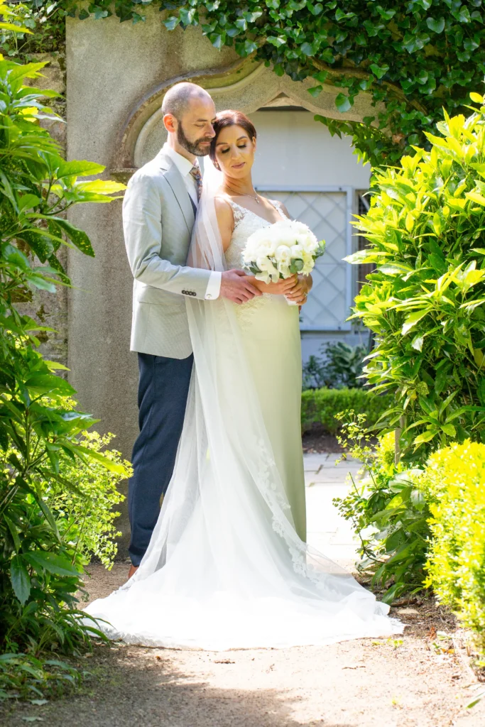 Natural wedding portrait in the Ardilaun Hotel gardens