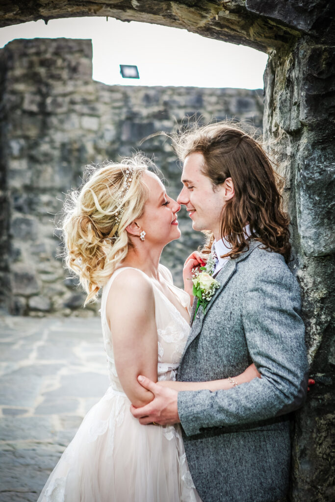 Zora and Noel beside the stone walls of Cloughan Castle